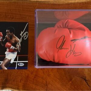 Autographed Sugar Ray Leonard & Tommy Hearns Red Boxing Glove with Display Case